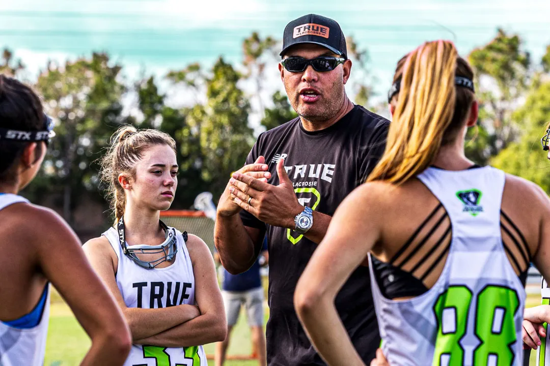 true lacrosse coach and players