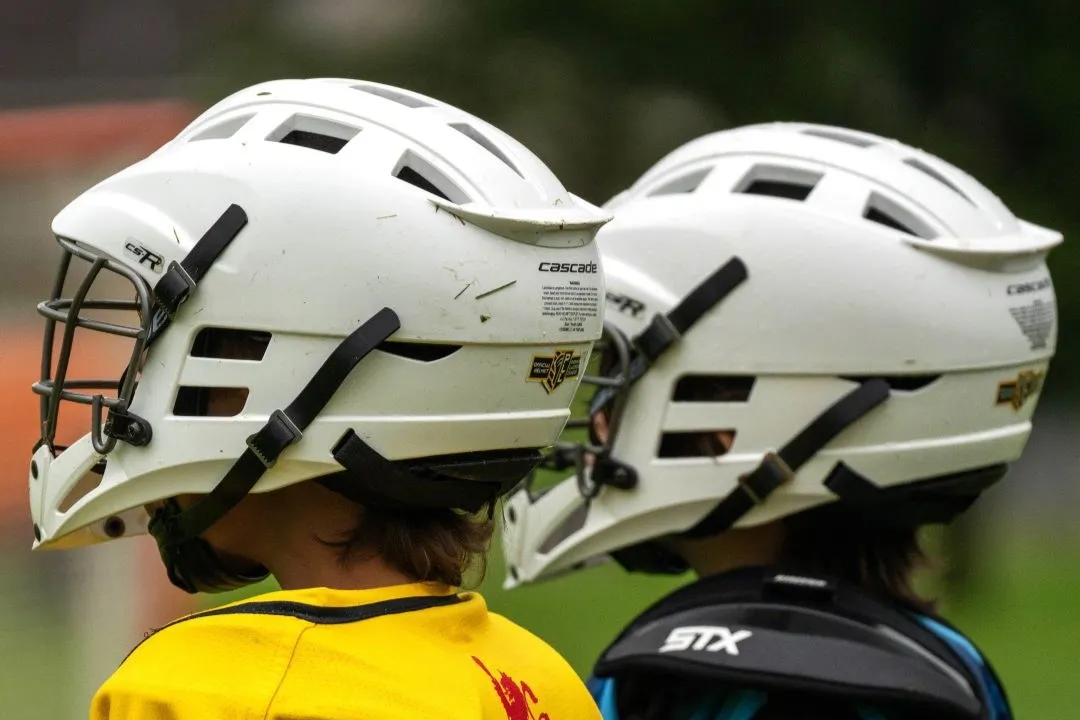 Youth players in helmets