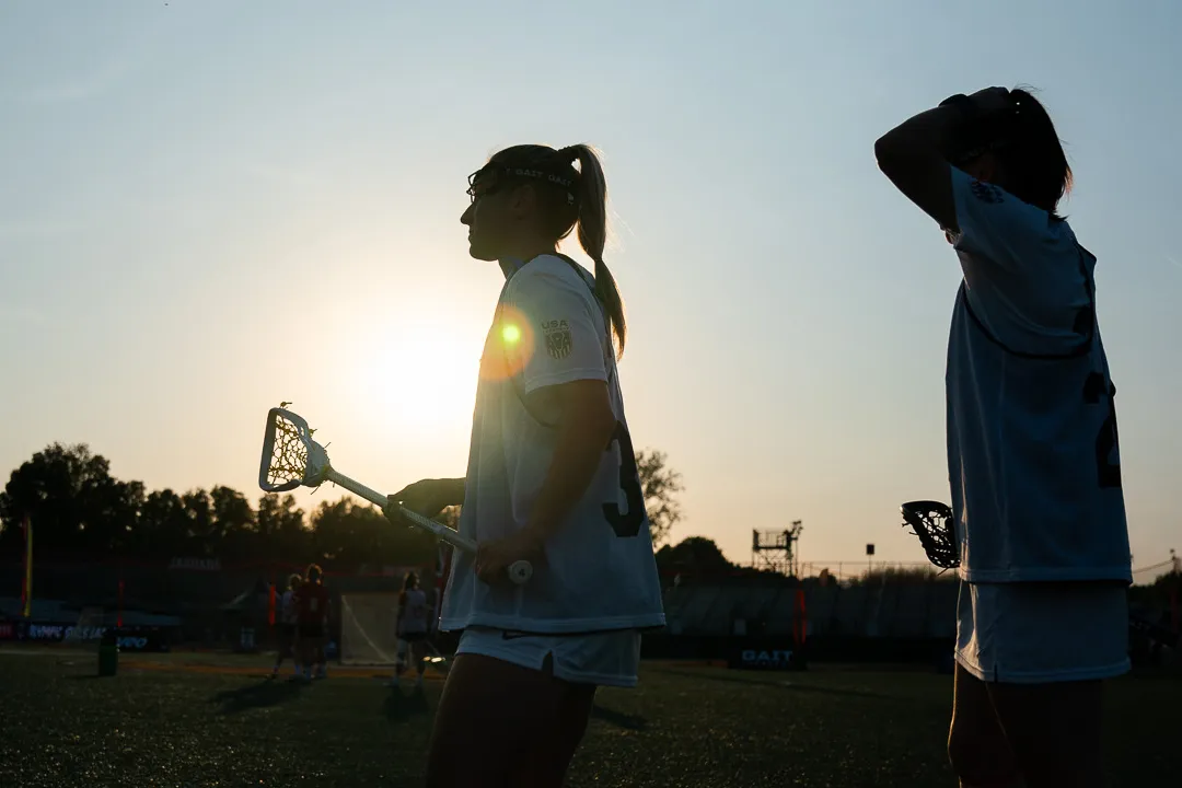 usa women's lacrosse players as sun rises