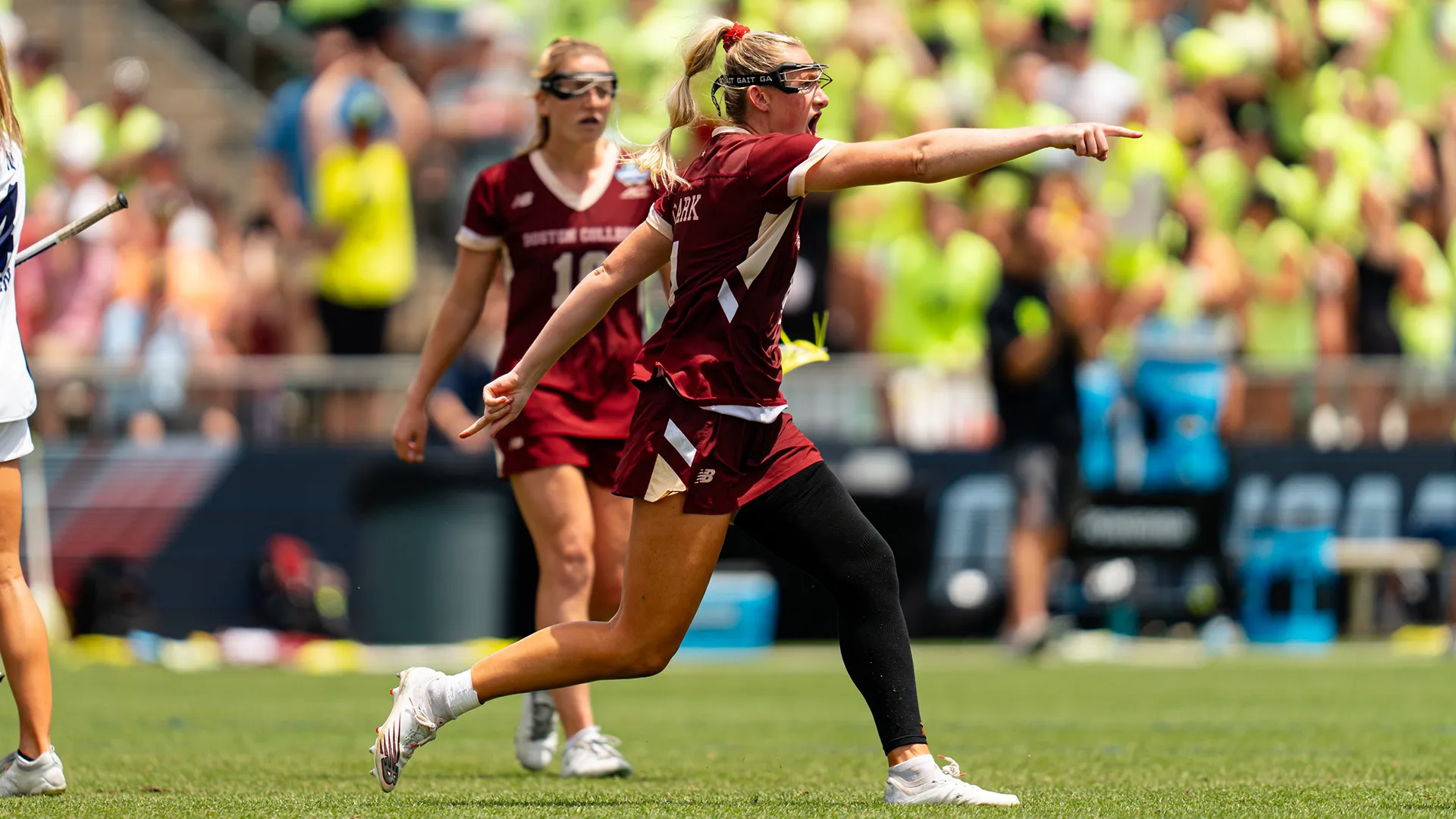 Boston College's Rachel Clark points in approval after scoring a goal in the 2024 NCAA championship game against Northwestern in Cary, N.C.