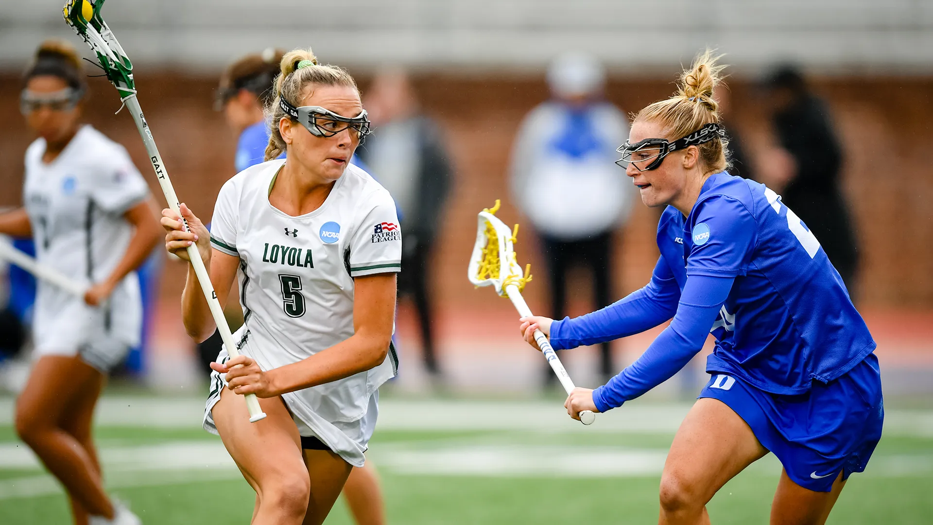 Loyola's Chase Boyle goes one-on-one with Duke's Maddie McCorkle in a 2024 NCAA tournament first-round game at Penn.