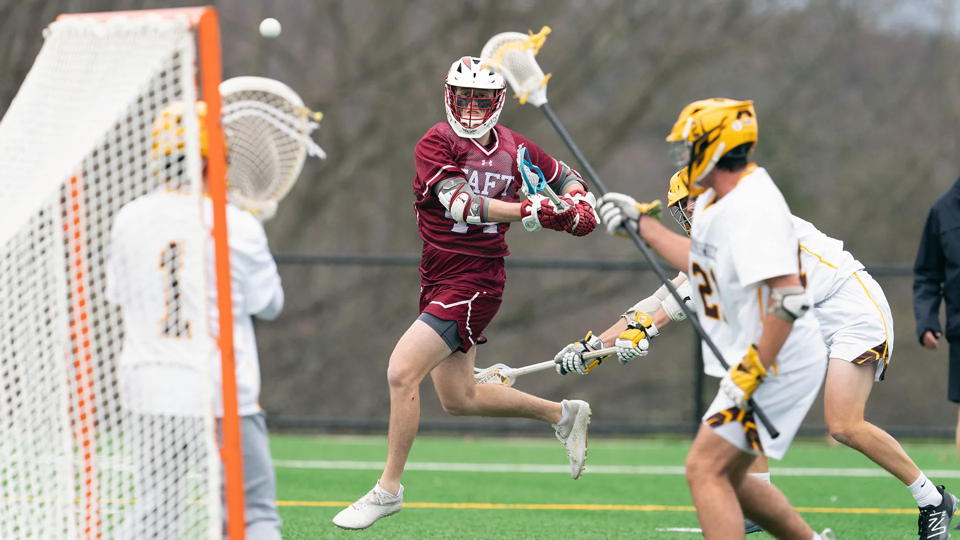 Taft (Conn.) midfielder Kaden Parsons shoots on the run during a 2024 game against Brunswick (Conn.)