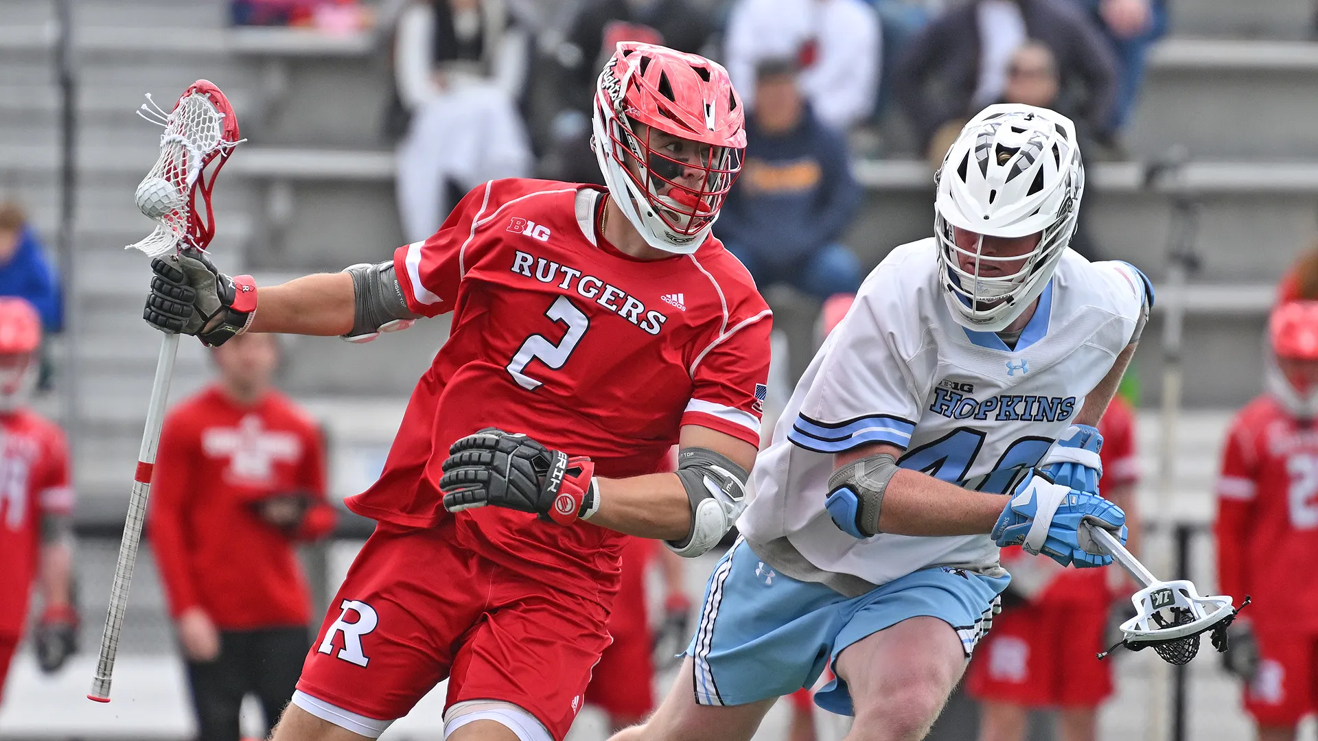 Rutgers Colin Kelly drives against Johns Hopkins in men's lacrosse.