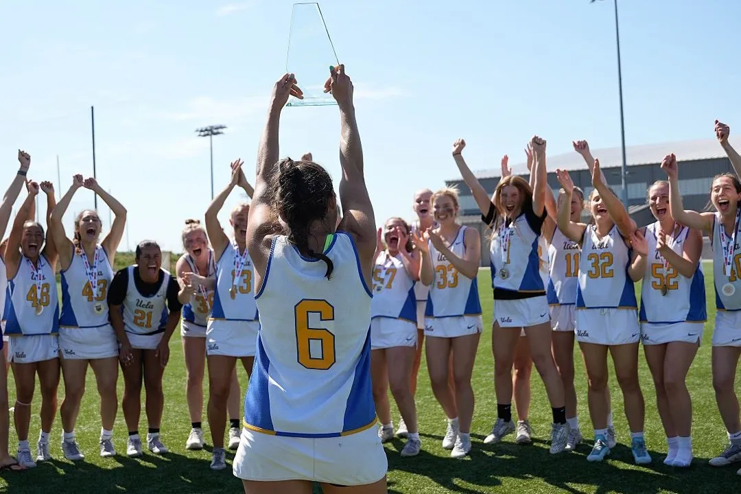 UCLA celebrates its 2024 WCLA title.