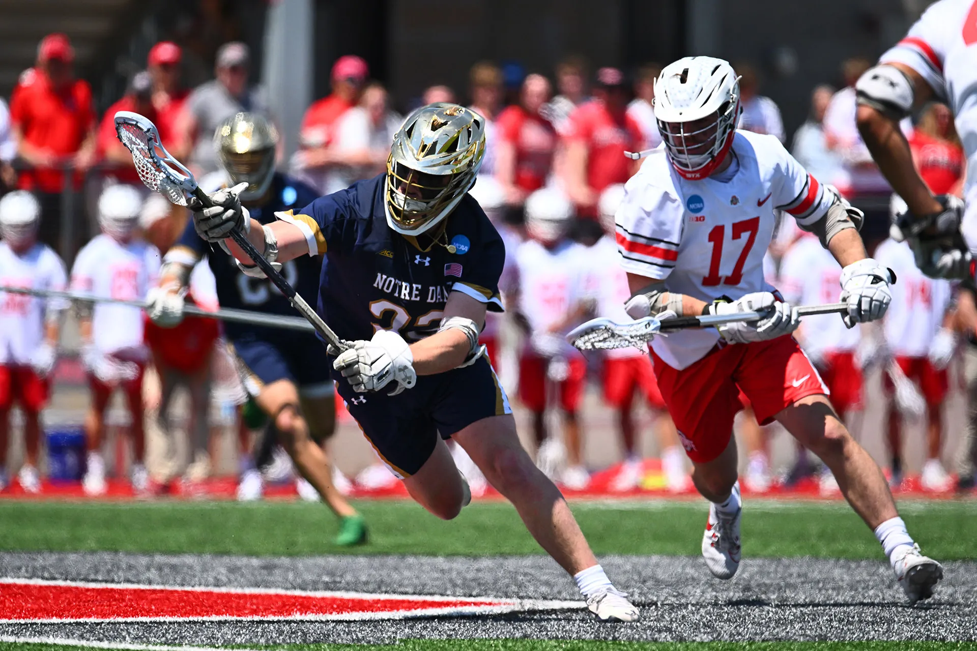 Will Lynch wins a faceoff for Notre Dame against Ohio State
