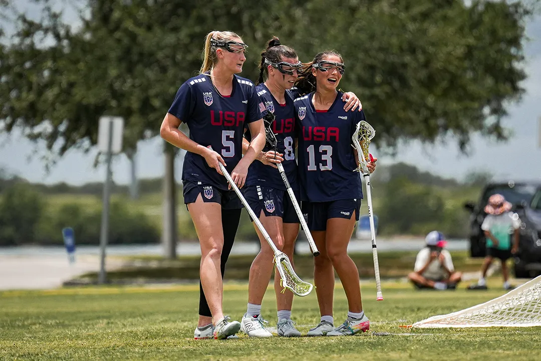 Rachel Clark, Charlotte North and Emma LoPinto celebrate a USA goal in a win over Peru
