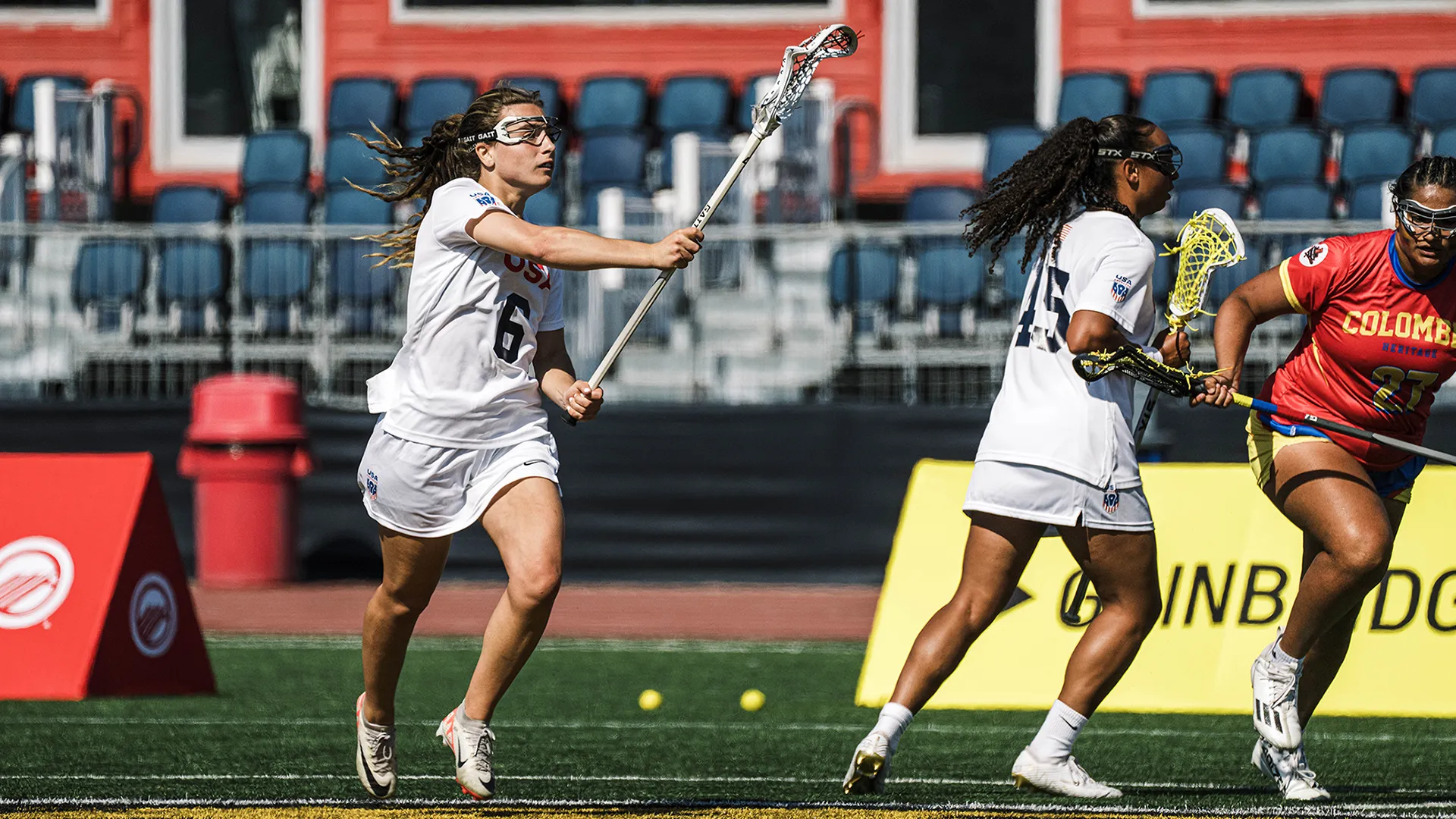 Ellie Masera passes the ball for the USA in a game against Colombia