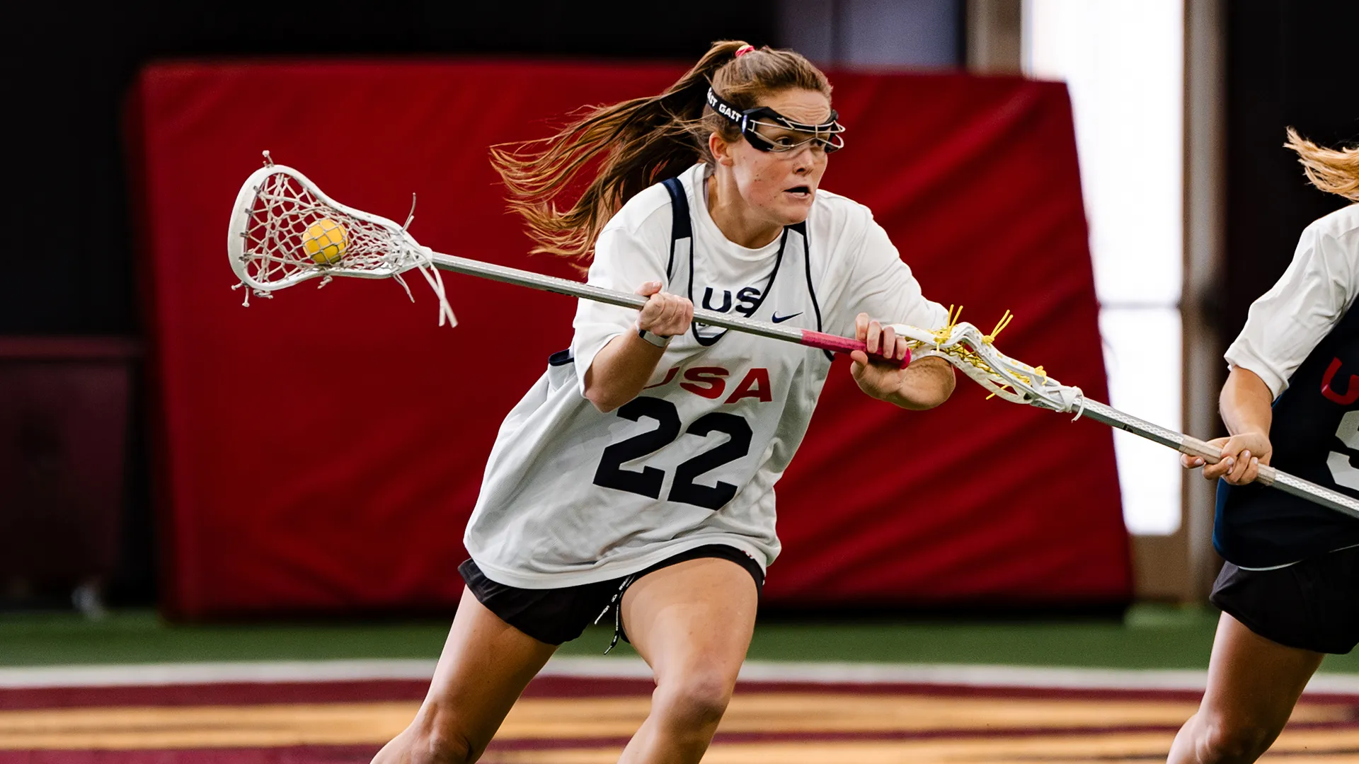 Erin Coykendall drives to the goal during a USA women's training camp.