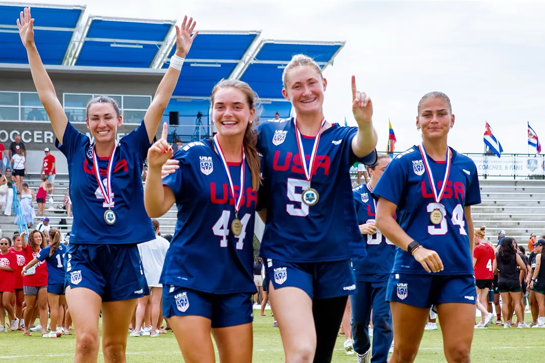 Marie McCool, Shea Baker, Rachel Clark and Kori Edmondson celebrate the USA women's lacrosse team's victory at the Pan-American championship