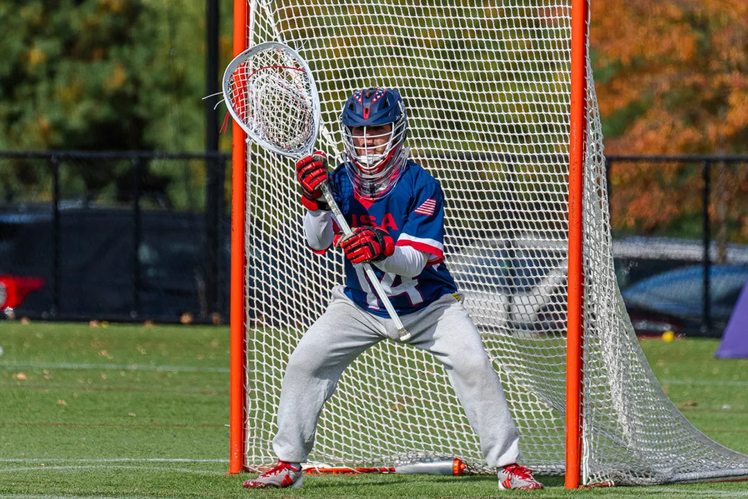 Jett Stake stands in front of the goal in the ready position for the USA U16 team during the 2024 Brogden Cup.
