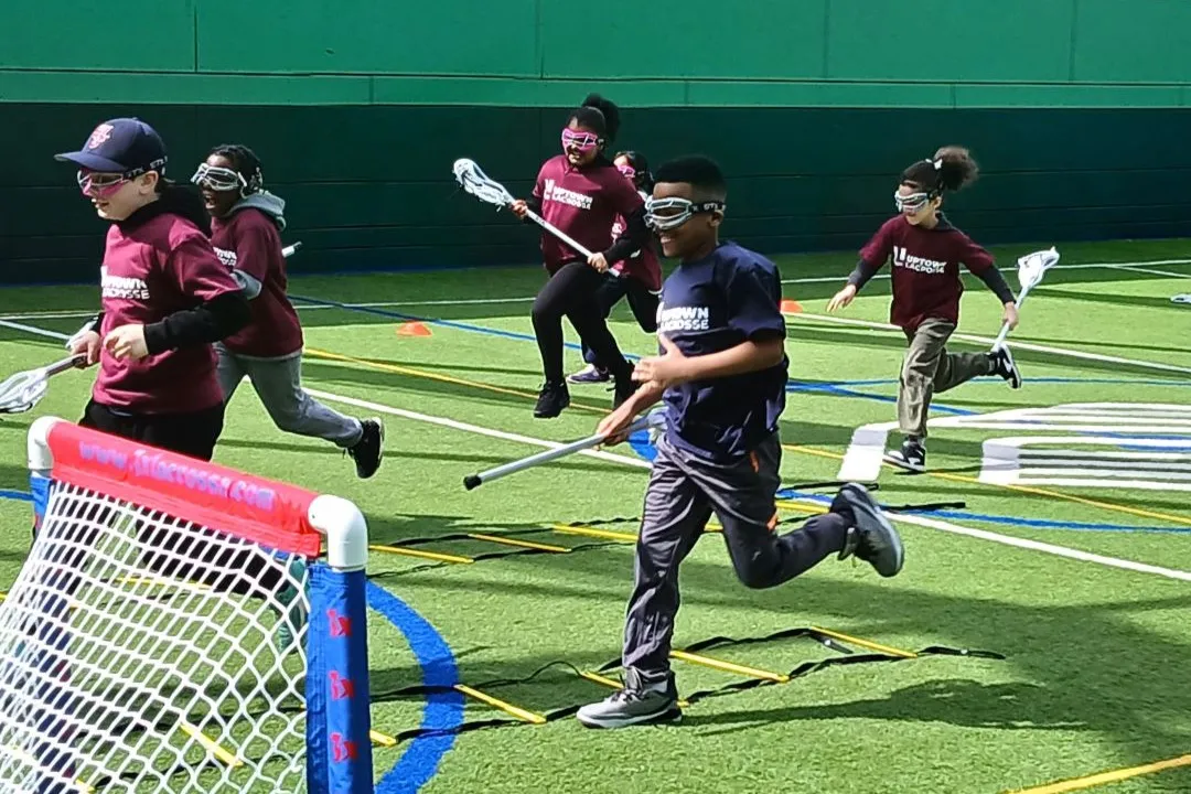 Uptown Lacrosse cradling race