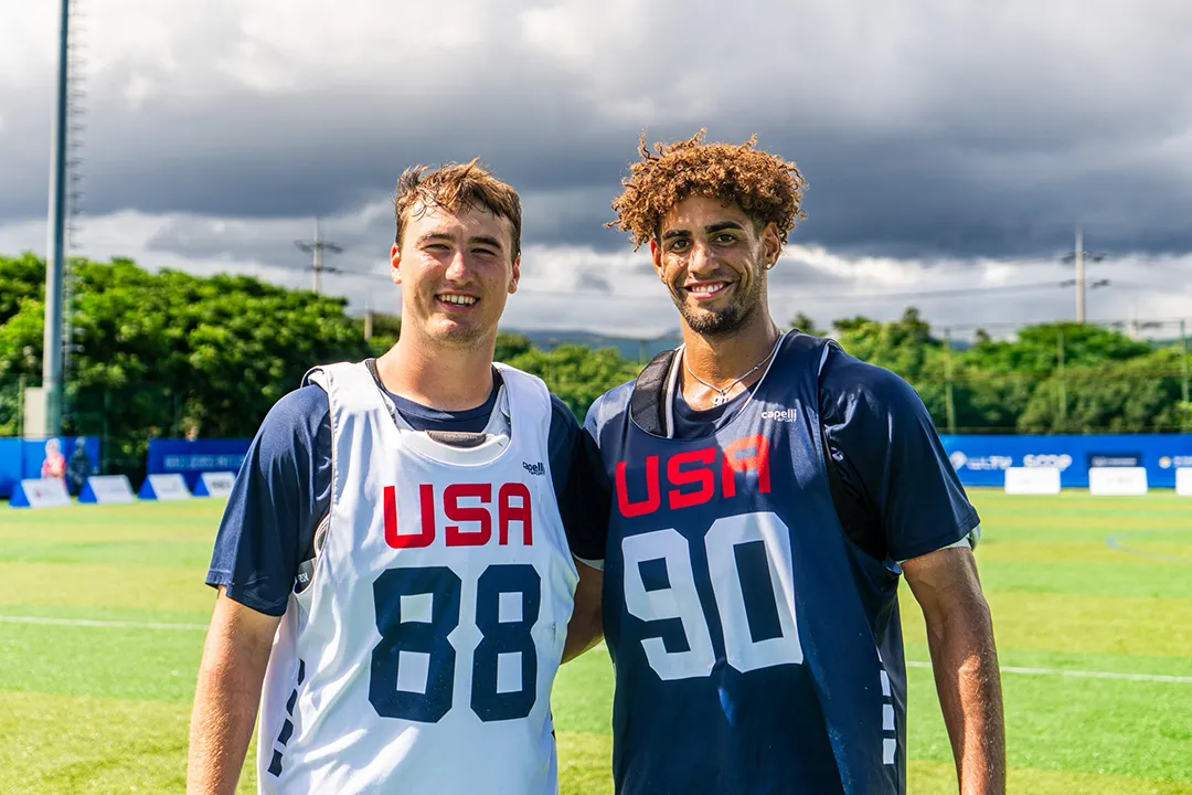 Colin Kurdyla and Shawn Lyght pose for a photo in Korea after being named team captains