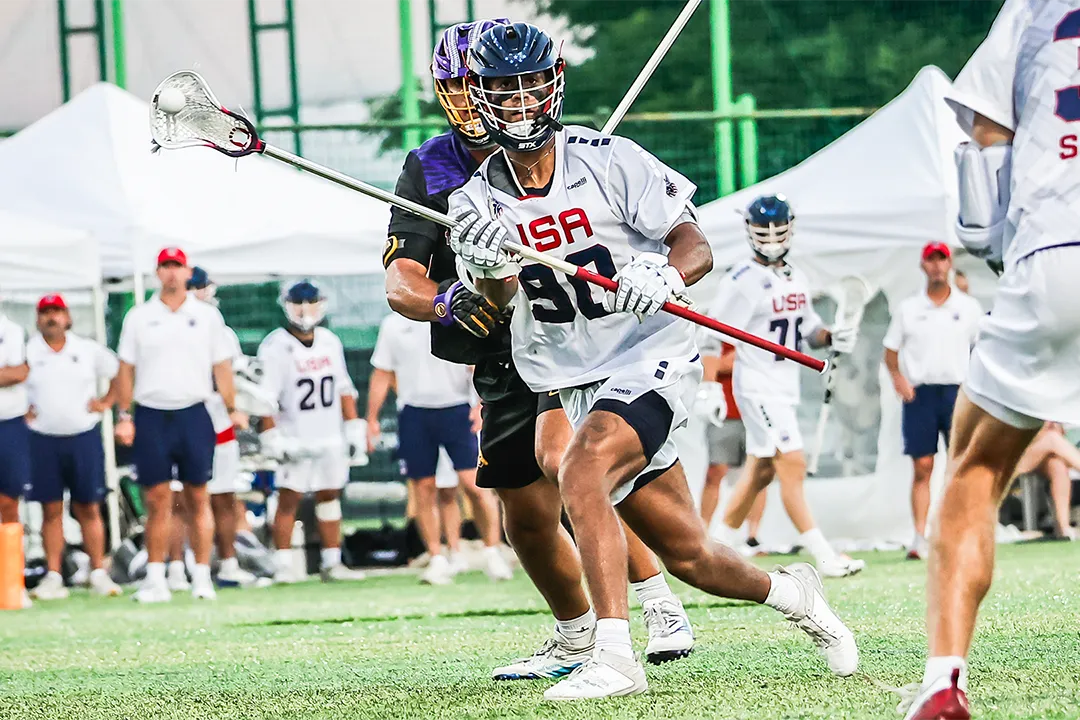 Shawn Lyght passes the ball to Jack Speidell transitioning up field during the World Lacrosse Men's U20 Championship semifinals Friday in South Korea.