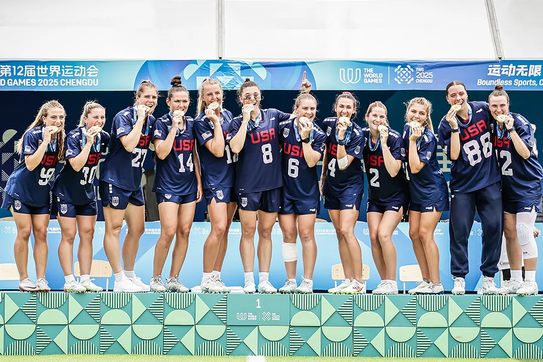 The U.S. women's lacrosse team stands on the platform after receiving their gold medals at The World Games in 2025