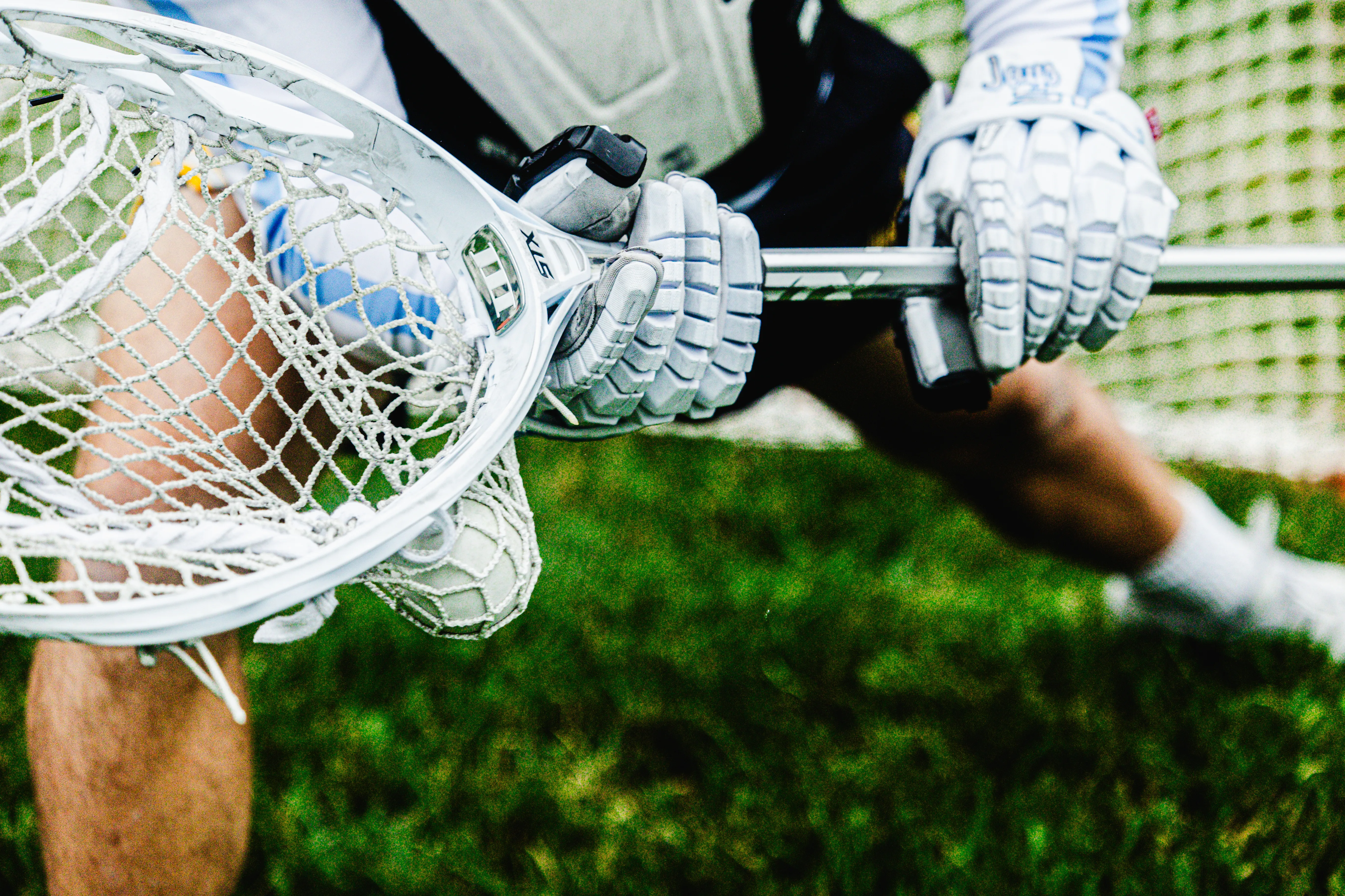 Image of lacrosse goalie making a save