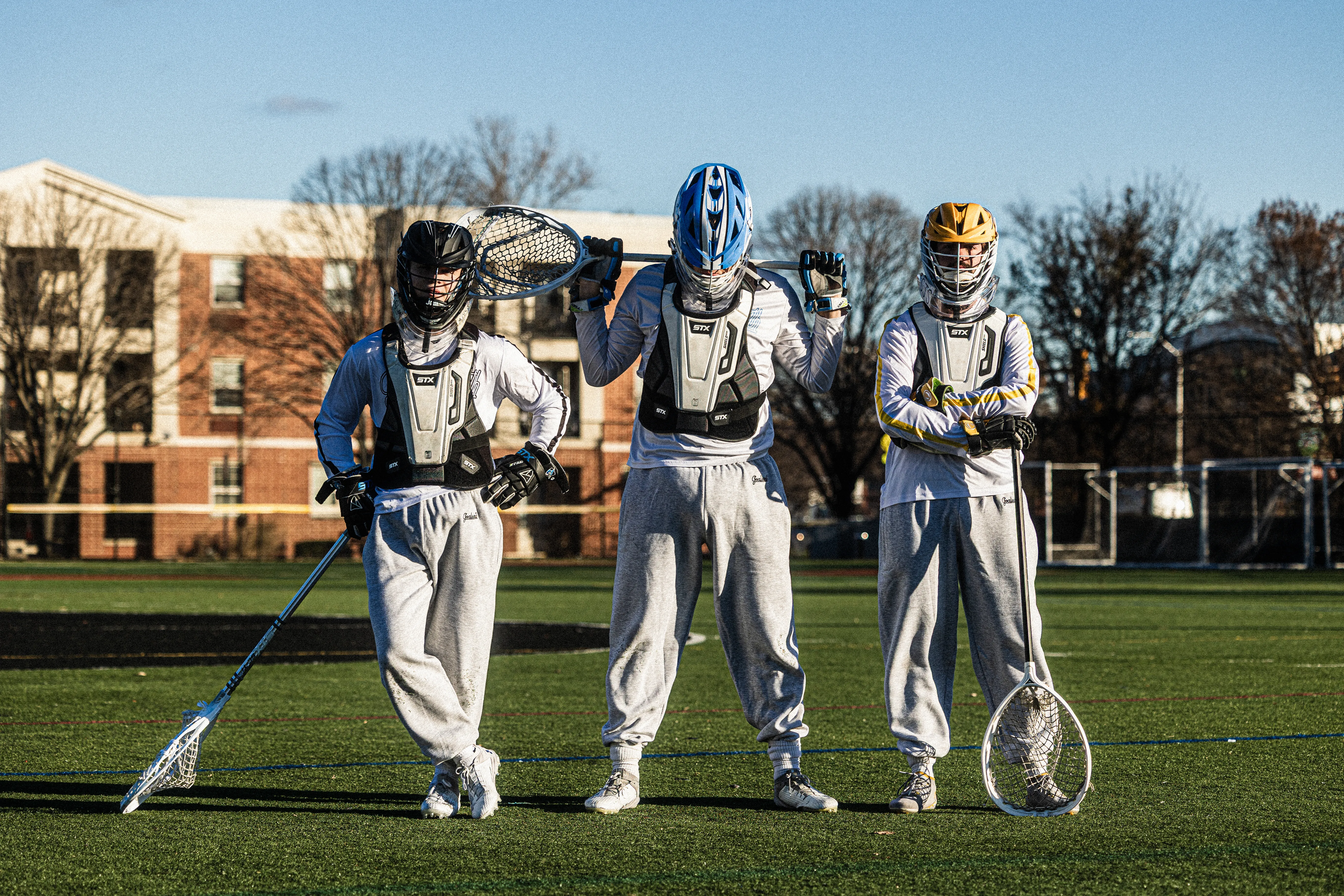 Image of three Goaliesmith goalies posing for a portrait