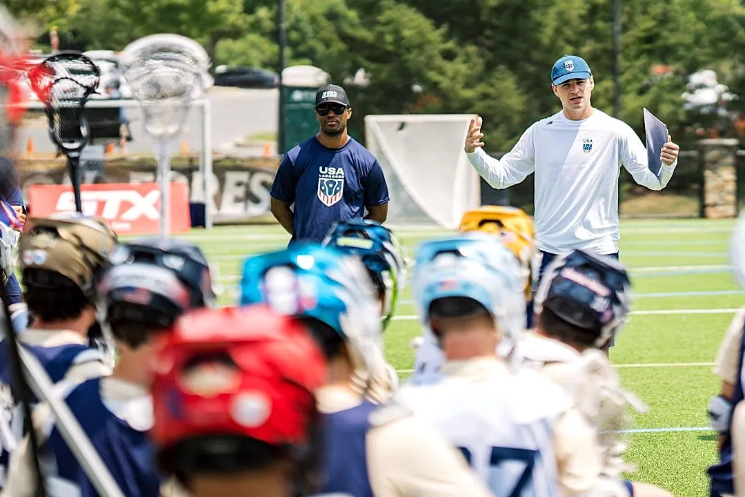 Coach speaks to his team