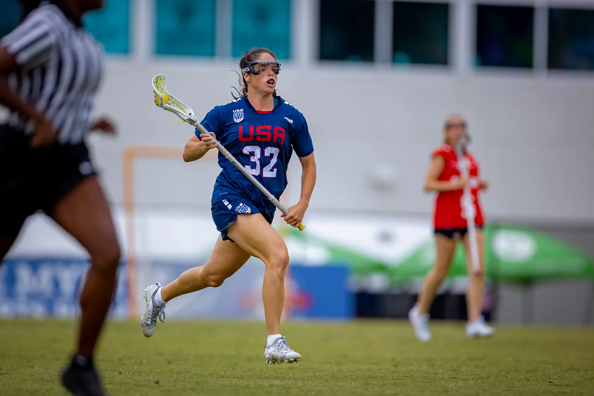 Sydney Scales runs up the field with the ball