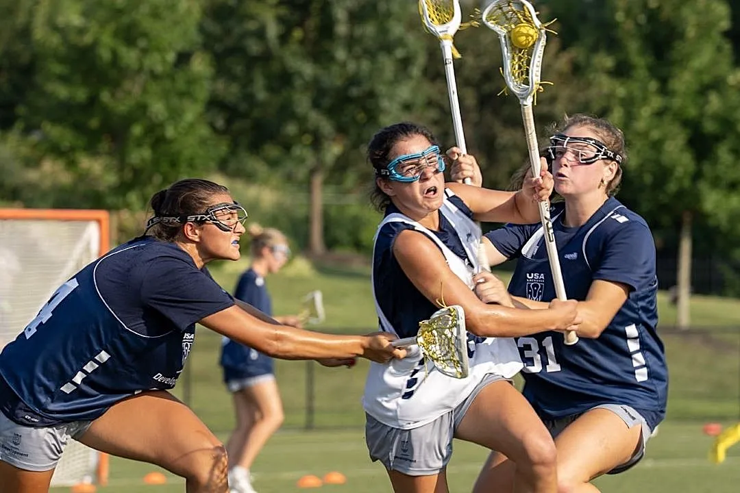 Girls playing lacrosse