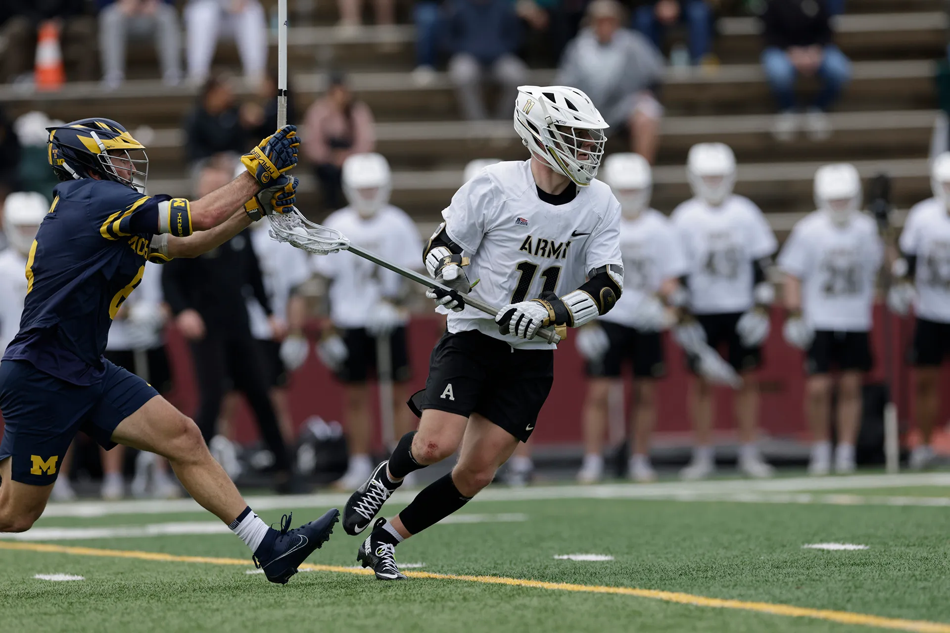 Hill Plunkett carries the ball for Army against Michigan