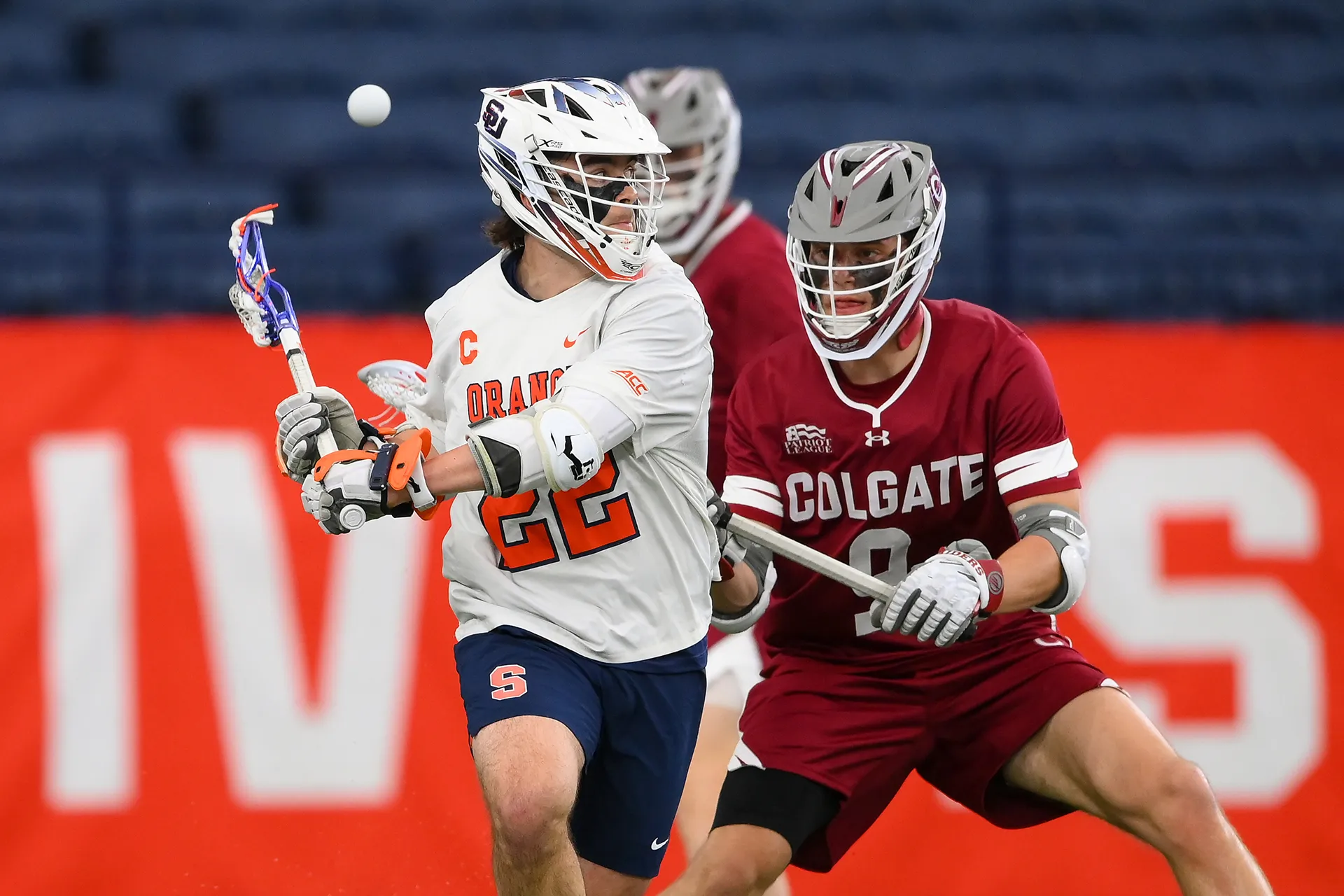 Joey Spallina throws a behind the back pass as he sets the Syracuse school record for career points