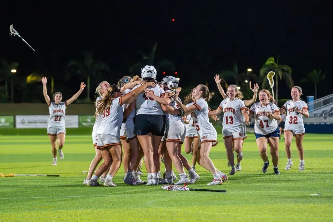 Denver celebrates after winning WCLA D-II Championship