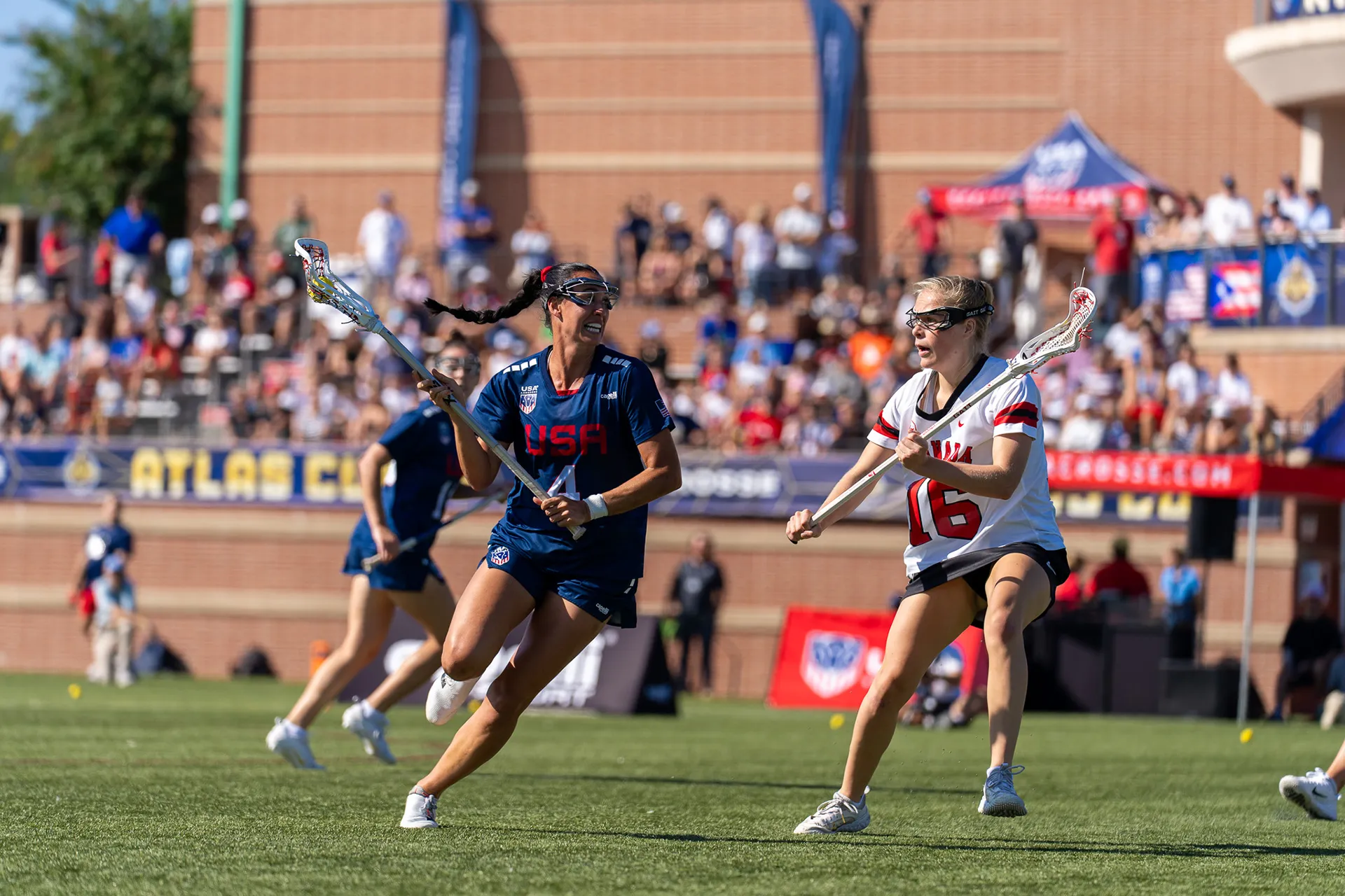 Marie McCool carries the lacrosse ball against Canada during the 2025 Atlas Cup