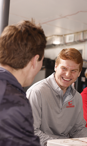 CJ Kirst sharing a laugh with his brothers in Chuck's Pub