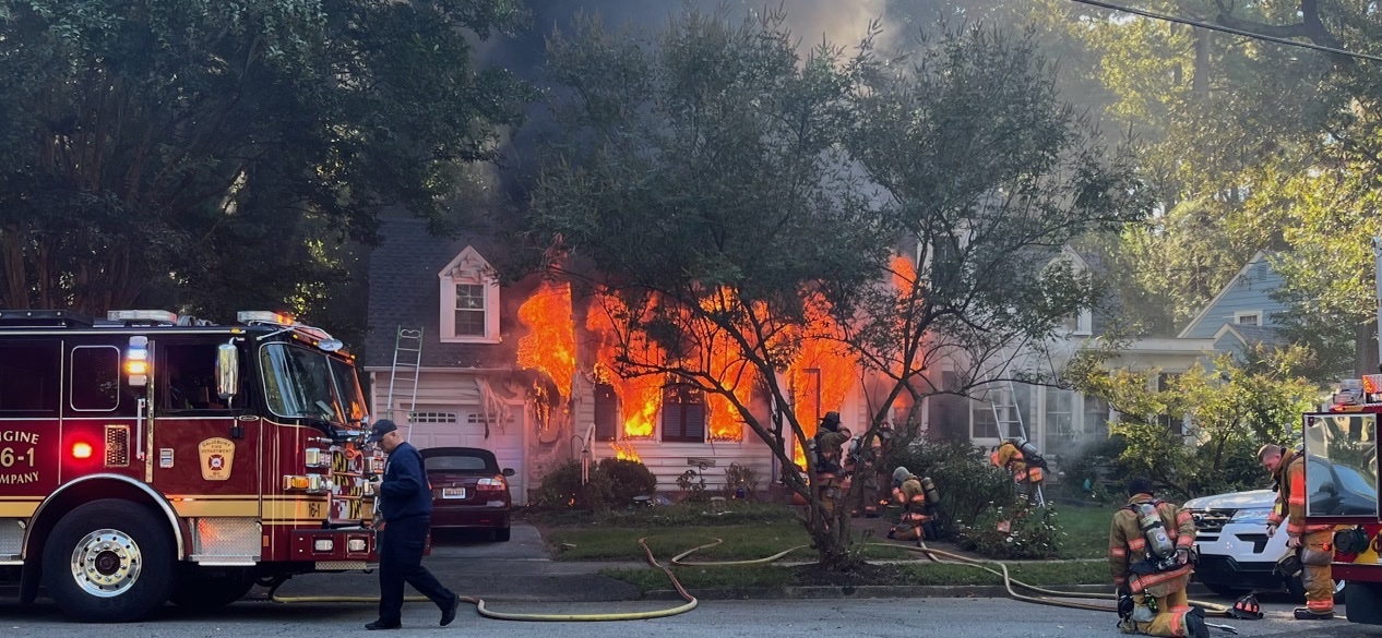 Firefighters work to extinguish the blze at Berkman's house in Salisbury's Pinehurst neighborhood Oct. 8, 2023.