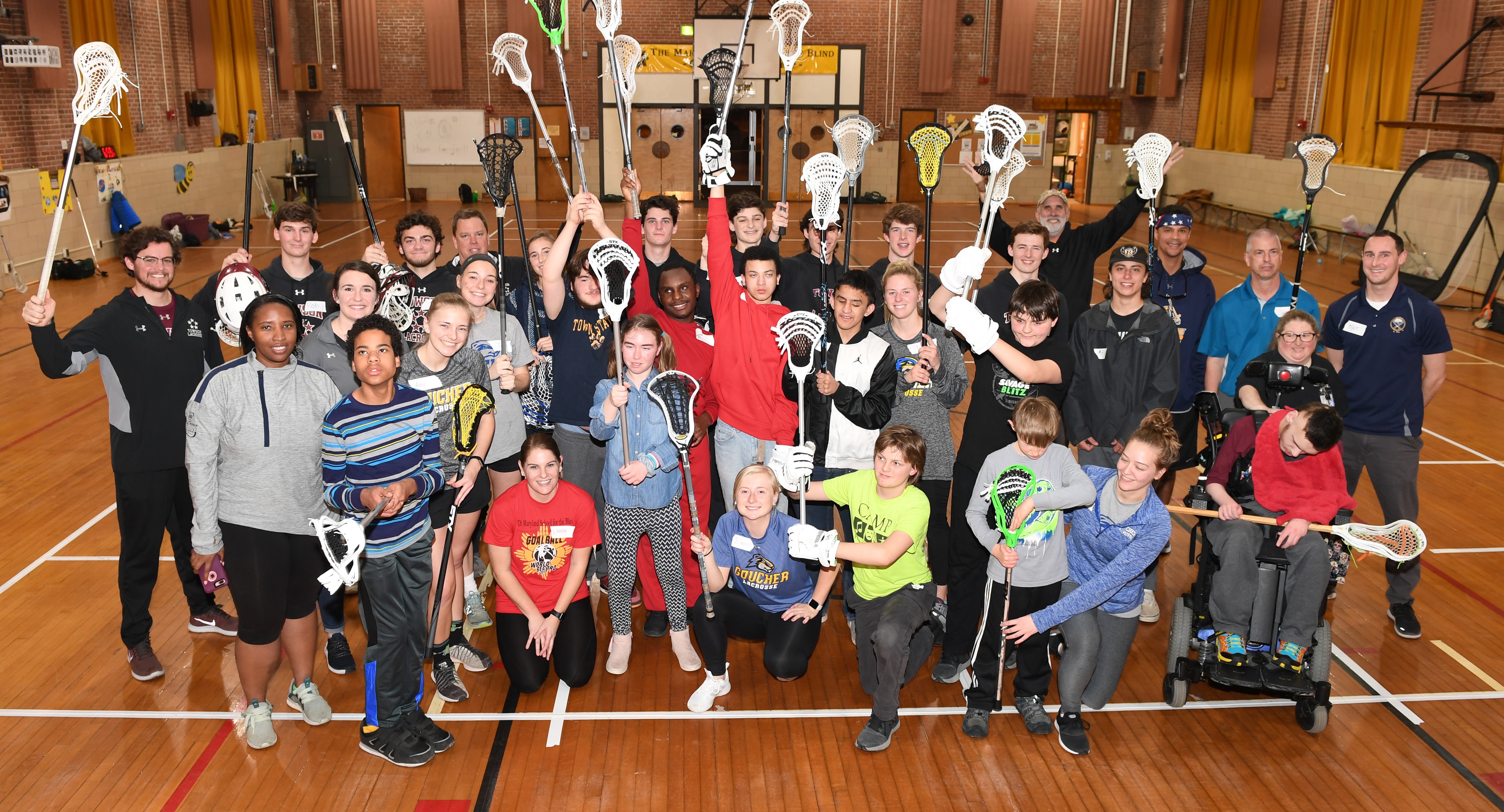 Group picture at lacrosse event at Maryland School for the Blind