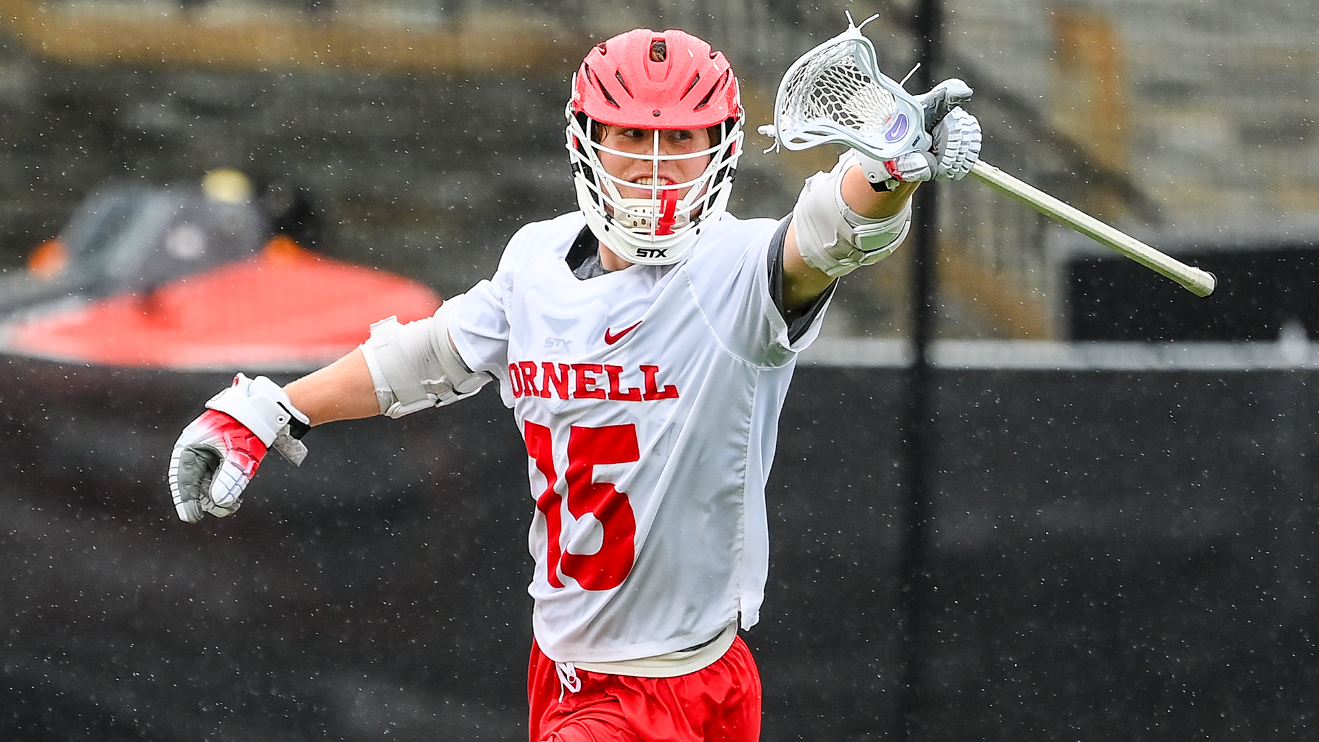 CJ Kirst points to a Cornell teammate after scoring in the Ivy League men's championship game against Princeton.