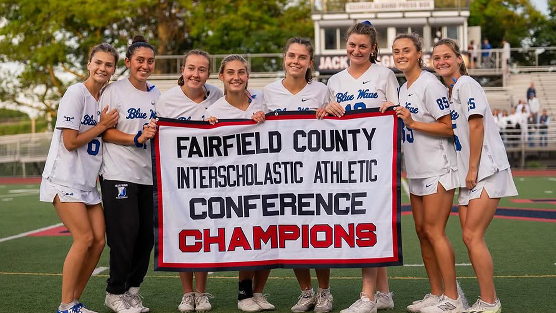 Darien with its FCIAC championship banner