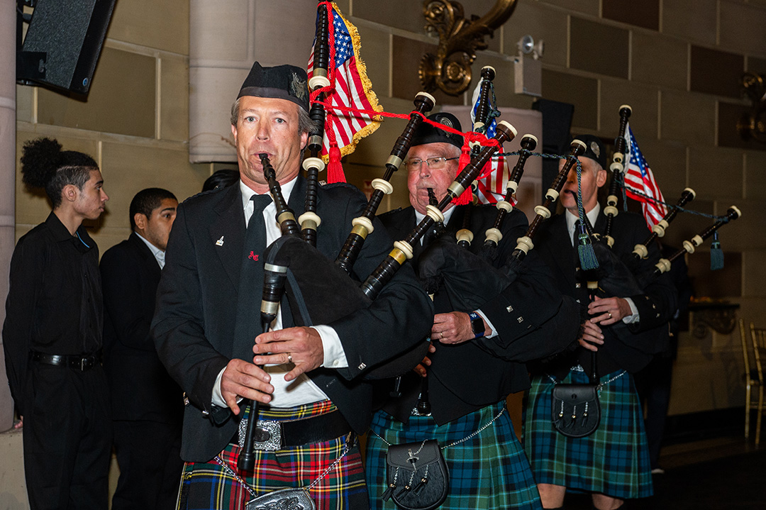 Bagpipers march in at the USA Lacrosse Foundation Gala
