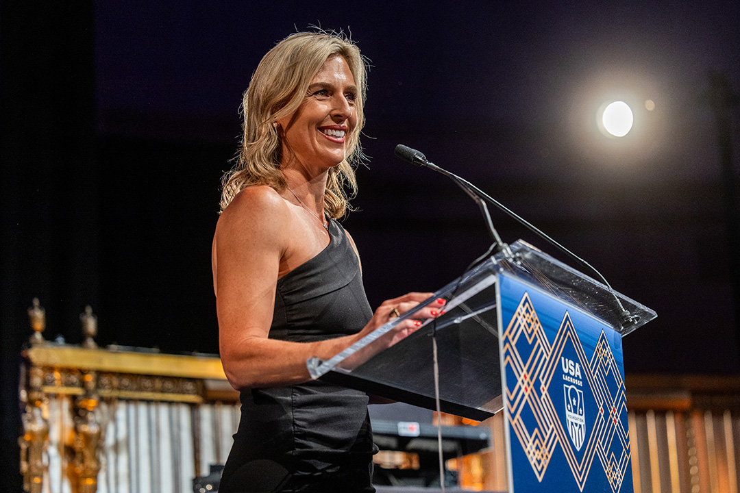 Sheehan Stanwick Burch at the podium as emcee for the Gala