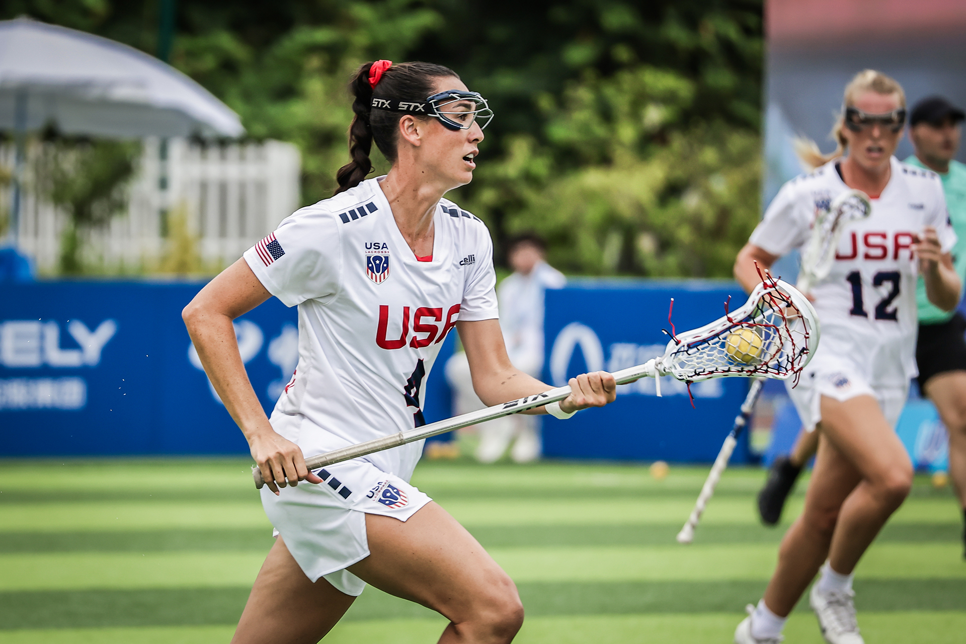 Marie McCool runs upfield with the ball against Japan in the semifinals at The World Games