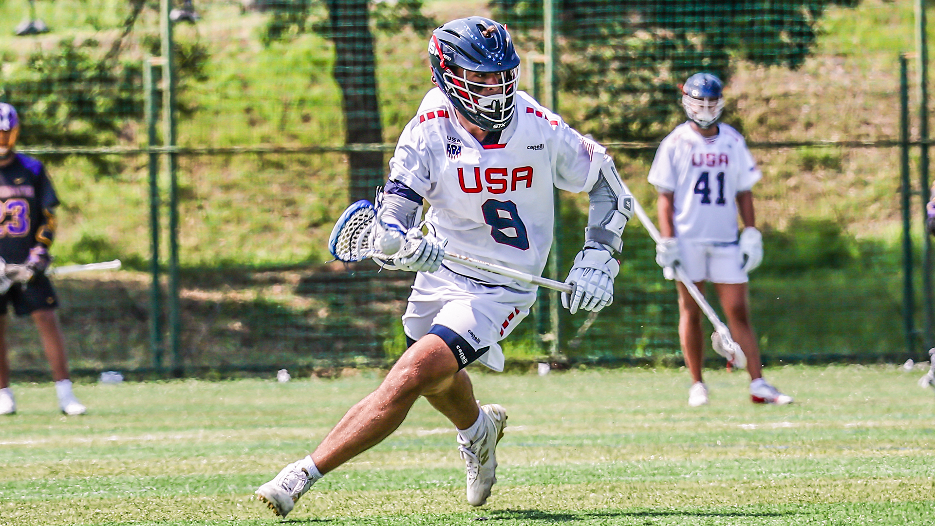 U.S. Men's U20 National Team attackman Owen Duffy carries the ball in his stick during a game against the Haudenosaunee Nationals at the World Lacrosse Men's U20 Championship in South Korea.