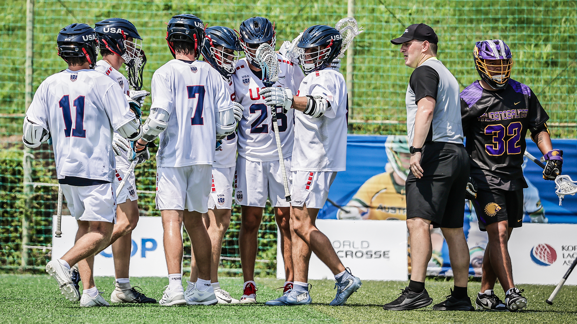 USA players celebrate after scoring a goal in a World Lacrosse Men's U20 Championship pool play game against the Haudenosaunee Nationals in South Korea.