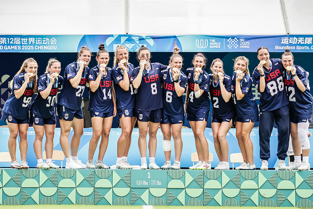 The U.S. women's lacrosse team stands on the platform after receiving their gold medals at The World Games in 2025