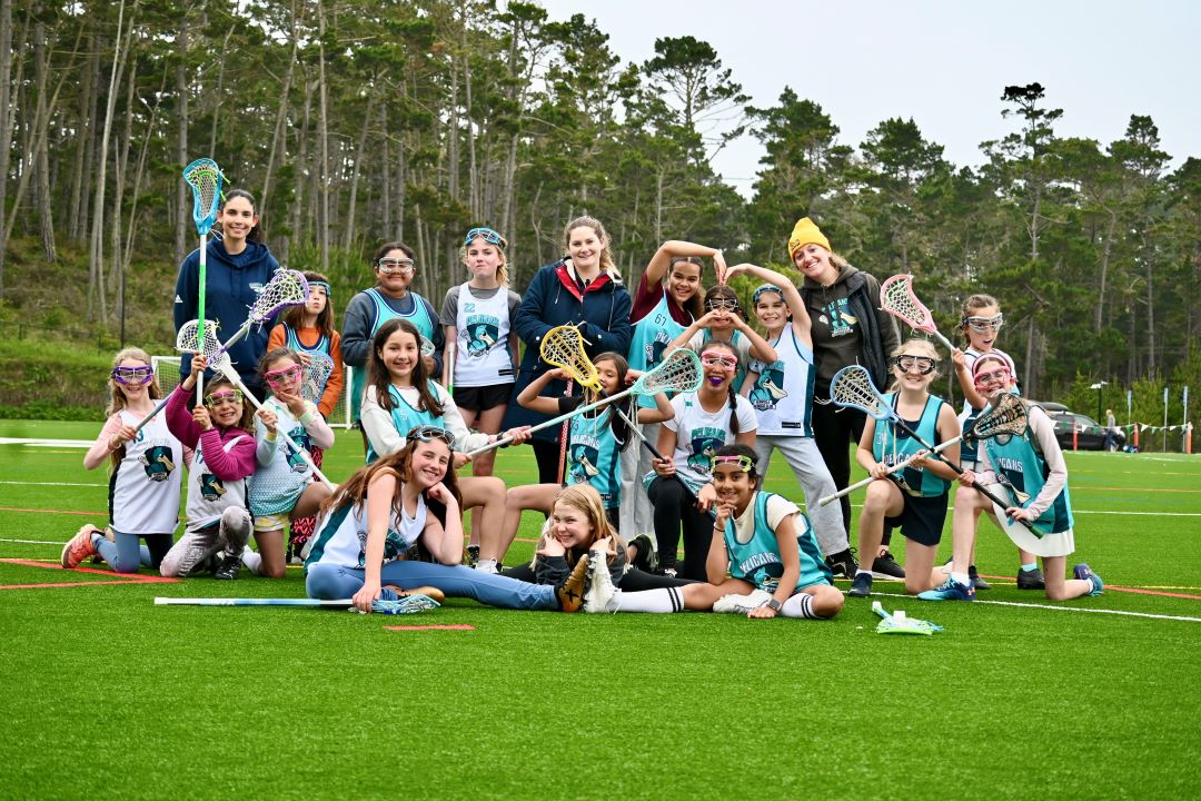 Group photo of Lacrosse the Bay girls having fun