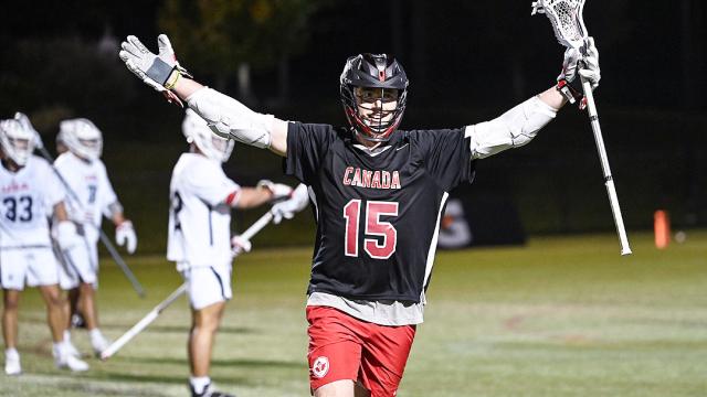 Dyson Williams gestures to the crowd at Tierney Field after scoring the game-winning goal in overtime.