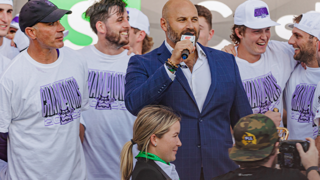 Mike Rabil presents the Waterdogs with last season's PLL championship.