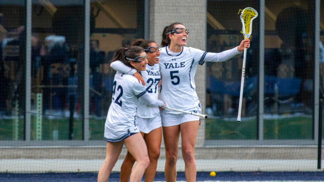 Yale players celebrate a score.