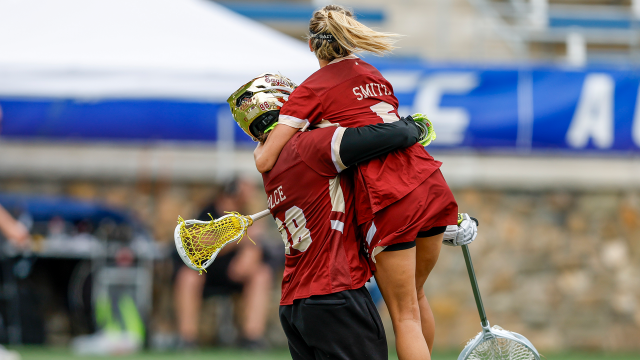 Shea Dolce and Belle Smith embrace after BC's ACC championship game win.