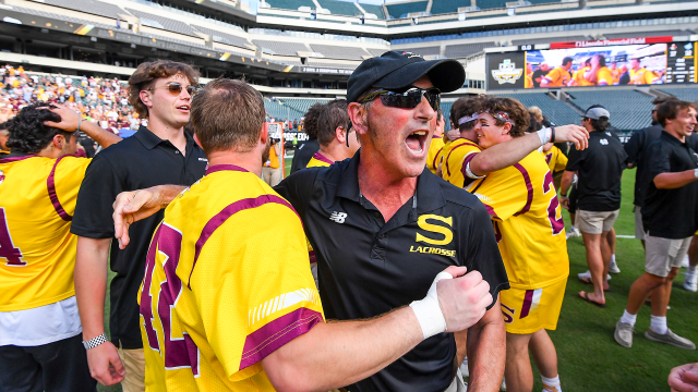 Salisbury coach Jim Berkman celebrates with his team after the 2023 NCAA Division III championship game at Lincoln Financial Field in Philadelphia.