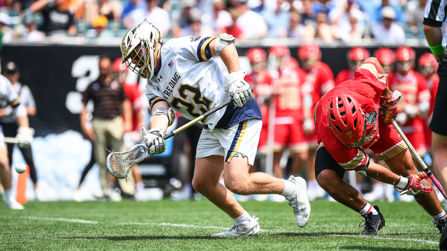 Notre Dame's Will Lynch wins a faceoff against Denver's Alec Stathakis in an NCAA semifinal matchup at Lincoln Financial Field in Philadelphia.