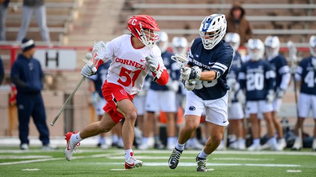 Cornell's William Firth drives with the ball against Penn State