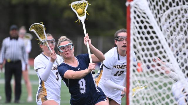 Action image of a Manchester Valley (Md.) girls' lacrosse player from March 2025