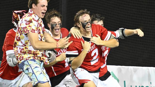 Jackson Mitchell gets mobbed by Calvert Hall (Md.) teammates after scoring the game-winning goal in the MIAA championship.