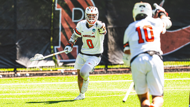 Colin Burns points to a teammate after scoring in the Princeton men's lacrosse team's NCAA tournament win over visiting Towson.