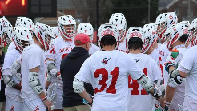 Dickinson men's lacrosse huddle